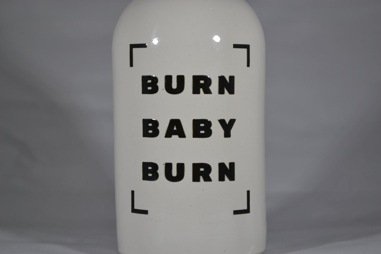 Oliedispenser – Burn Baby Burn